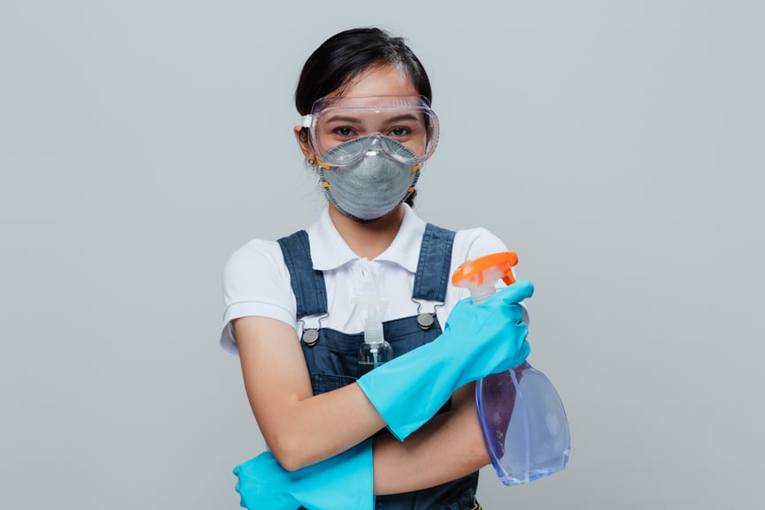 Woman with Cleaning Supplies